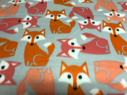 ORANGE FOXES ON BLUE