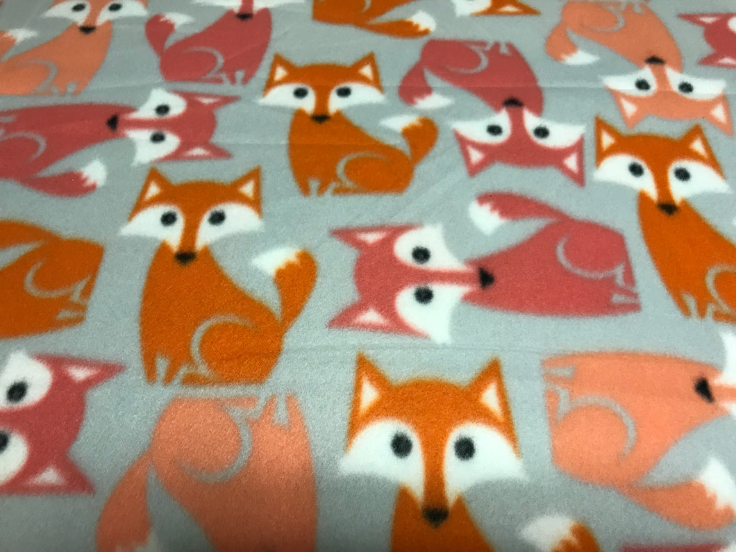 ORANGE FOXES ON BLUE