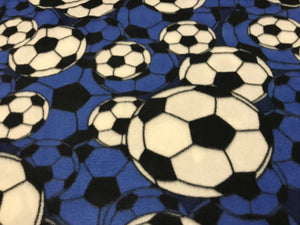 SOCCER BALLS ON BLUE