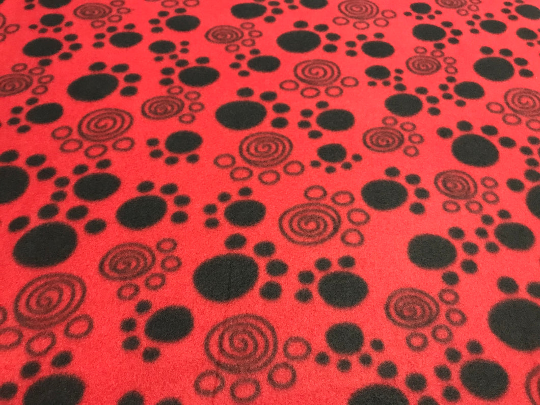 BLACK PAW PRINTS ON RED